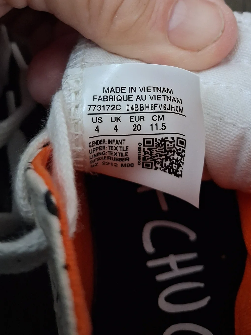Converse Kids White Canvas High-Tops with Orange Interior and Black Script
